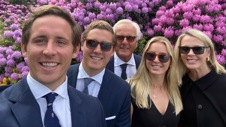 Deborah Norville smiling with her husband and three kids in 2025