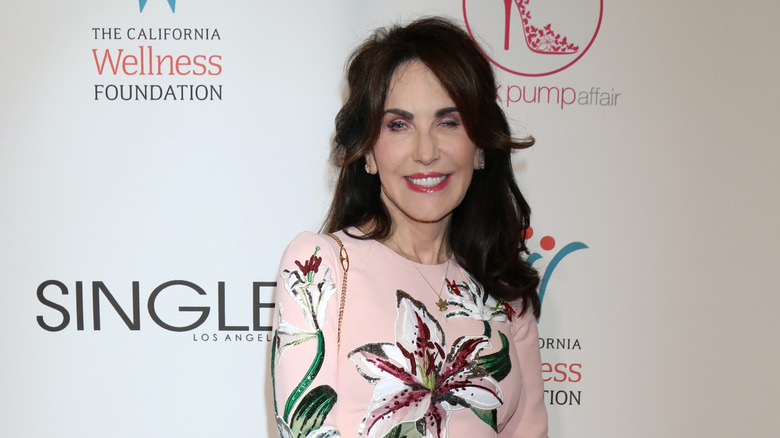 Robin McGraw posing at an event