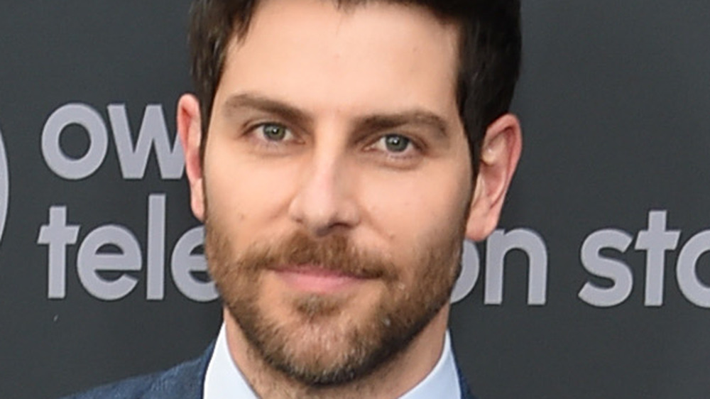 David Giuntoli posing at event