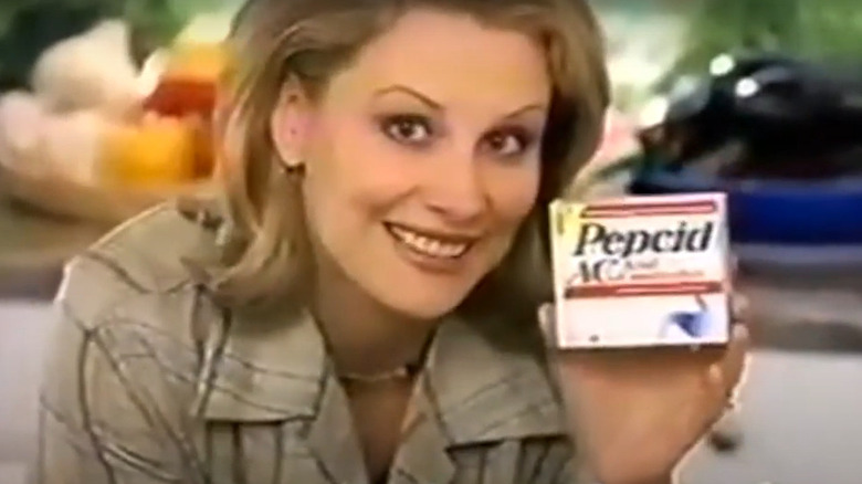 Faith Daniels posing in a Pepcid AC ad