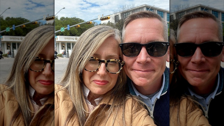 Kelly and Clint harp pose in a selfie wearing glasses on a street in Austin