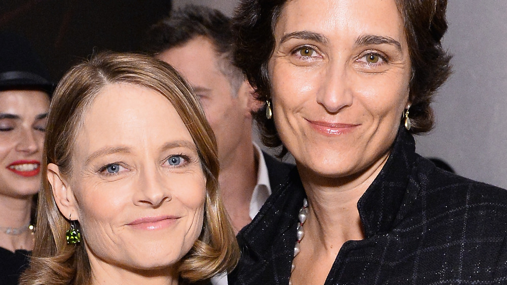 Jodie Foster smiles with wife Alexandra Hedison