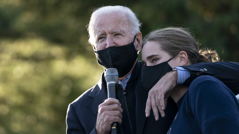 Joe Biden putting arm around Maisy Biden