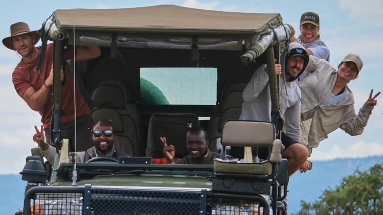 Brooks Laich on safari, leaning out of a van