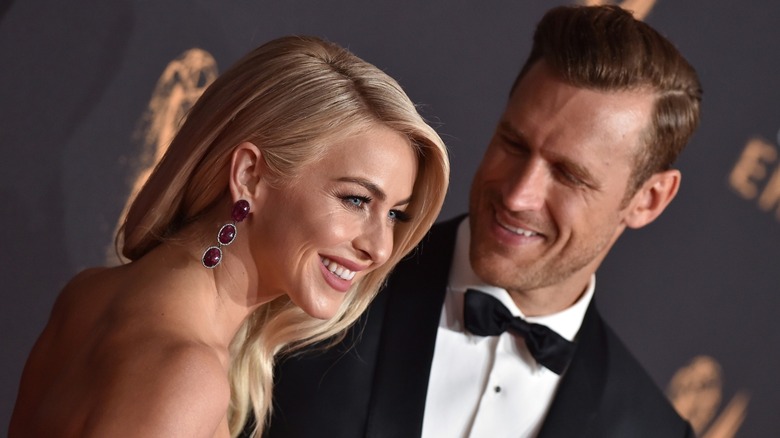 Brooks Laich smiling down at Julianne Hough on a red carpet