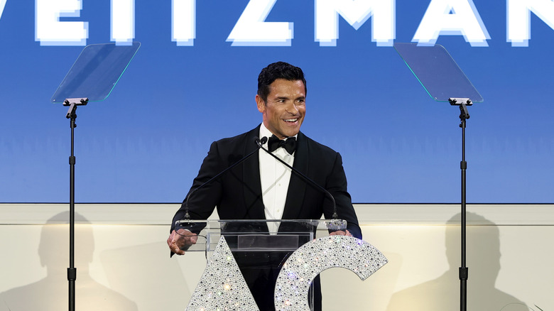 Mark Consuelos speaking on stage