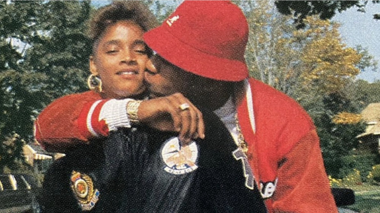 LL Cool J kissing Simone I. Smith on the cheek