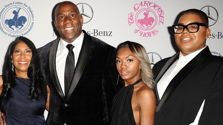 Magic Johnson and his family on the red carpet