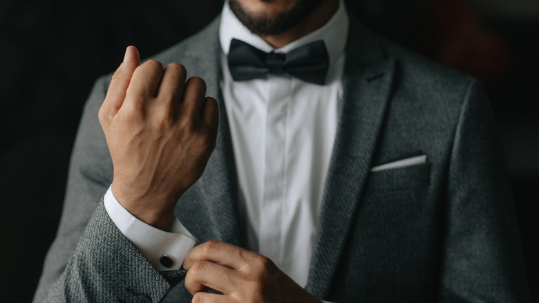 Black man wearing a suit and bow tie