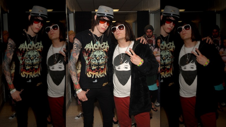 Trace Cyrus and Mason Musso of Metro Station hanging out backstage