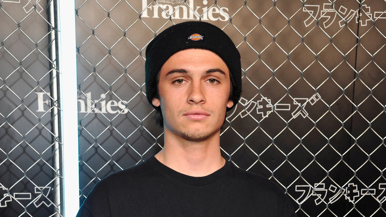 Dylan Jagger Lee posing at the Frankies Bikini Resort fashion show in 2019