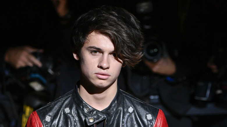 Dylan Jagger Lee posing at Dolce & Gabbana fashion week in 2016