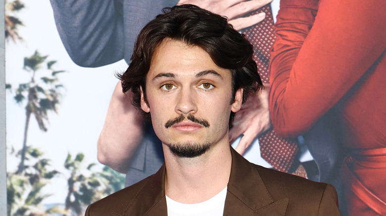 Dylan Jagger Lee posing at "The Naked Gun" premiere in 2025