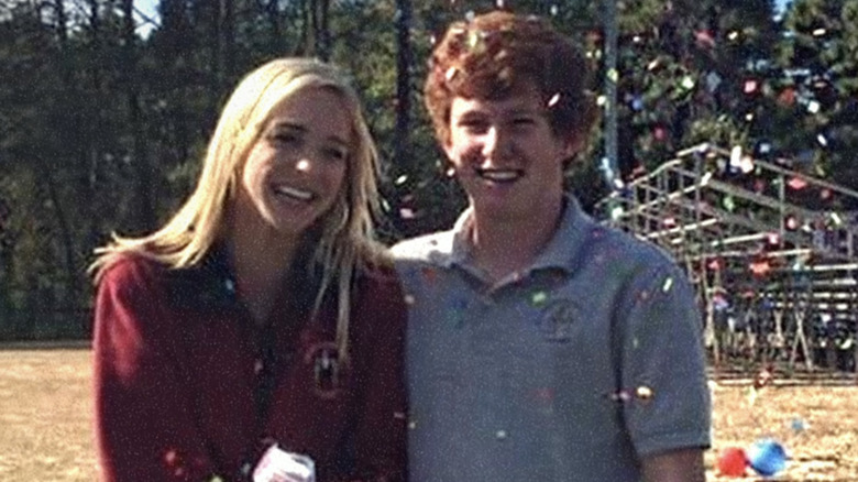 Paul Murdaugh and Morgan Doughty Bostick smile next to each other outside surrounded by confetti in the air