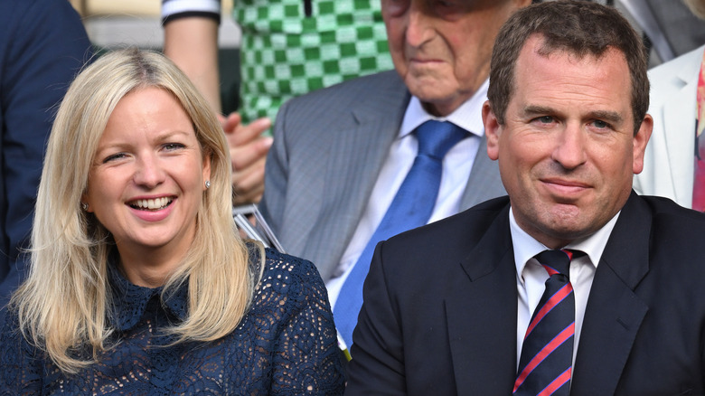 Lindsay Wallace and Peter Phillips smiling at event