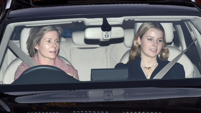 Serena Armstrong-Jones driving while Lady Margarita Armstrong-Jones sits in the passenger