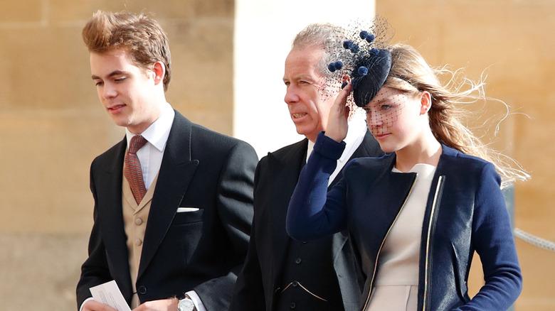 Charles Armstrong-Jones, David Armstrong-Jones, and Lady Margarita Armstrong-Jones walking outside