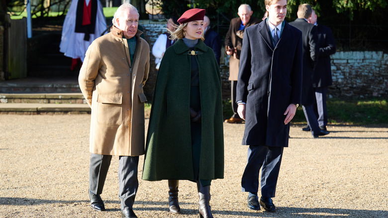 David Armstrong-Jones, Lady Margarita Armstrong-Jones, and Charles Armstrong-Jones walking outside