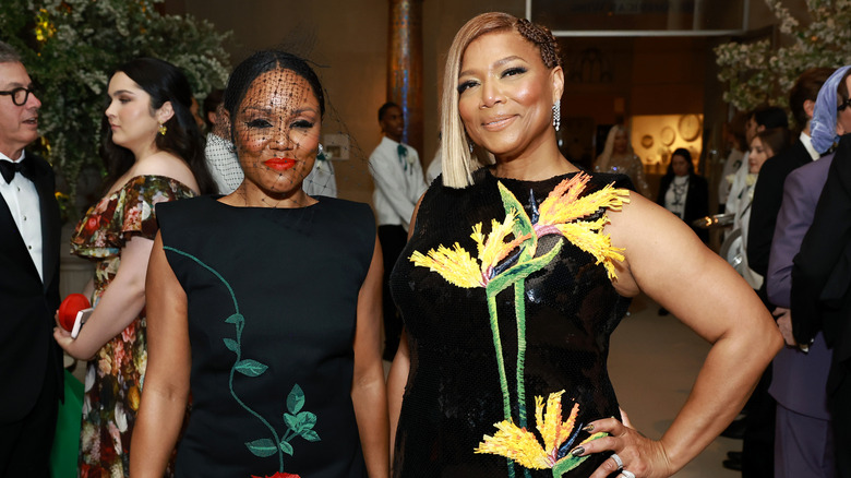 Eboni Nichols and Queen Latifah smiling