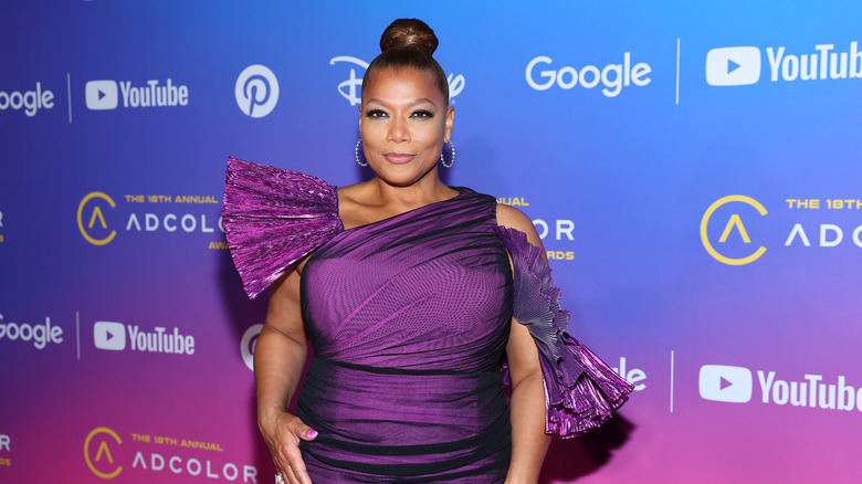 Queen Latifah in a purple gown