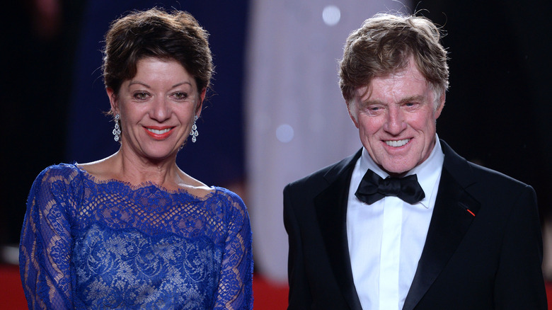 Robert Redford and Sibylle Szaggars smiling