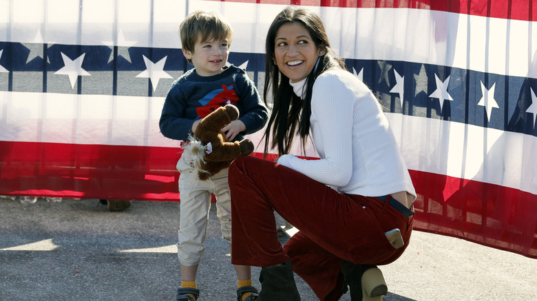 Katie Miller at a 2024 Trump rally with her son, Jackson