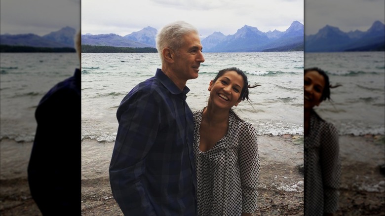 Katie Miller posing with her father at Glacier National Park