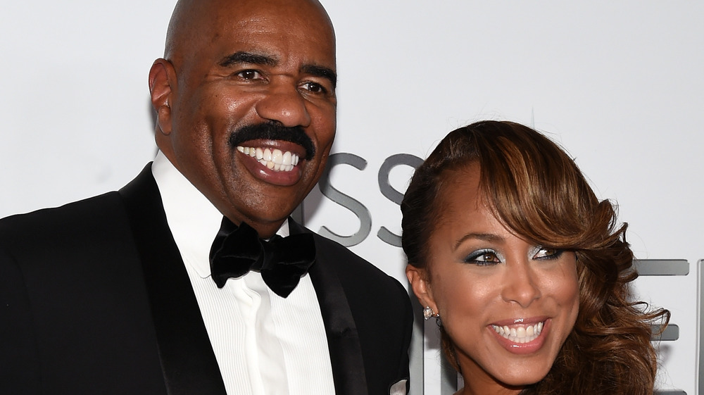 Steve and Marjorie Harvey at event