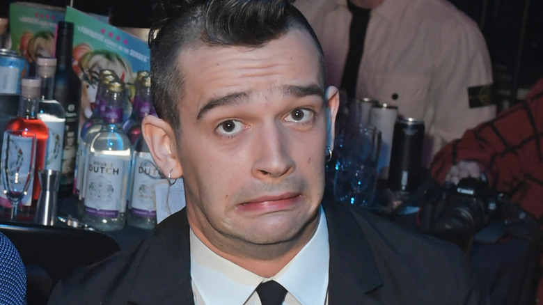 Matt Healy grimacing