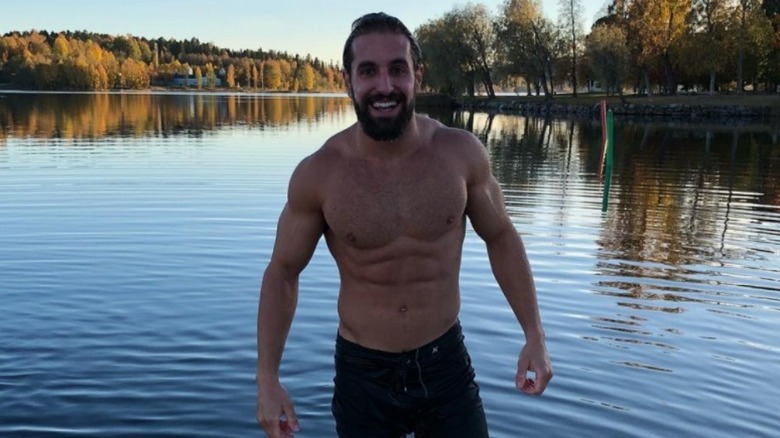 Jeff Caravello smiling while standing in a river