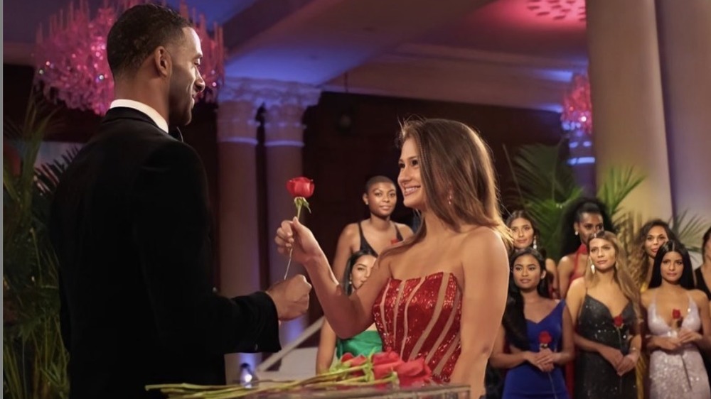 Kaili Anderson receiving rose on the Bachelor