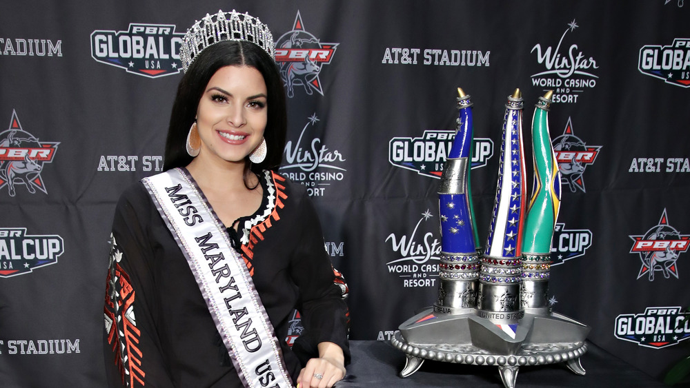 Mari Pepin posing with her crown