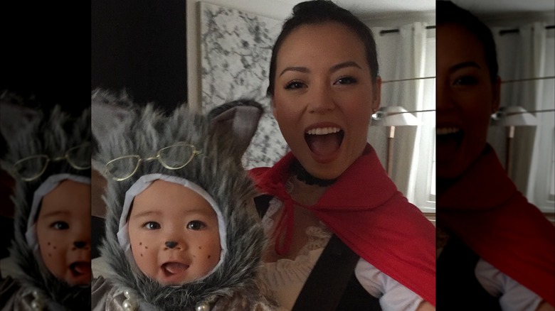 Dara Huang and Wolfie looking happy in Halloween costumes