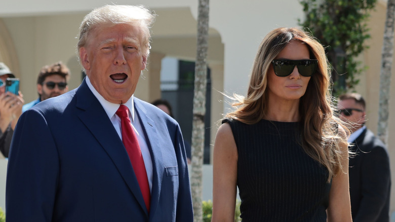 Donald and Melania Trump standing together