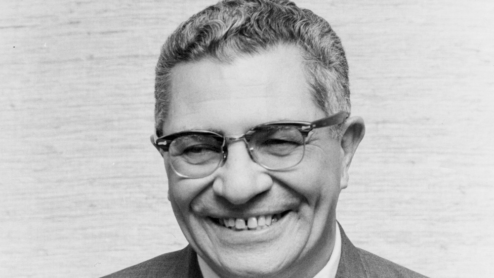 Vince Lombardi smiling, black-and-white photo