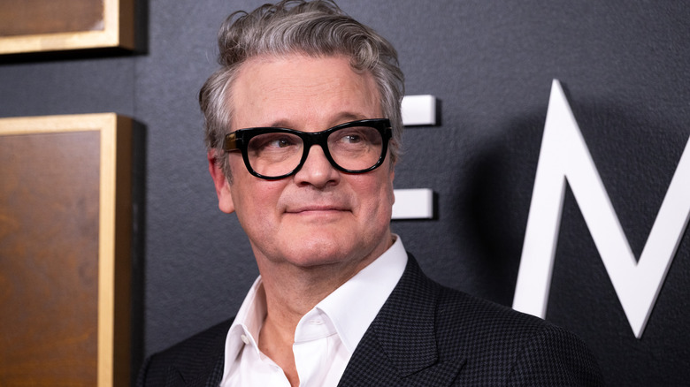 Colin Firth looking to his left