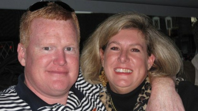 Maggie Murdaugh in leopard scarf with Alex Murdaugh in striped shirt