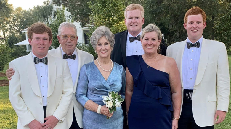 The Murdaugh families pose for a photo in formal attire