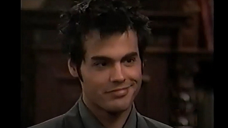Nikolas smirking
