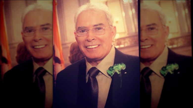 Anthony Guilfoyle smiling in a suit