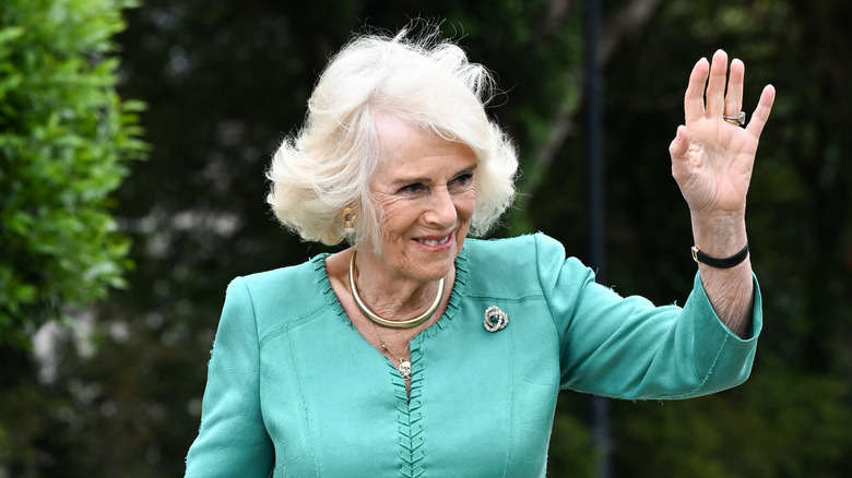 Queen Camilla waving