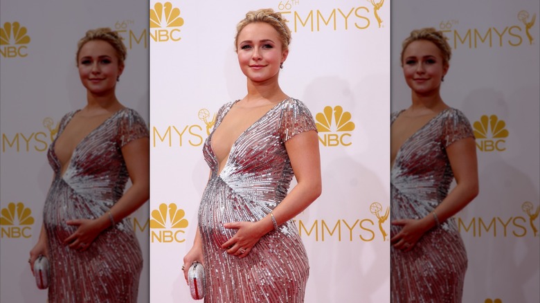 Hayden Panettiere holding her baby bump