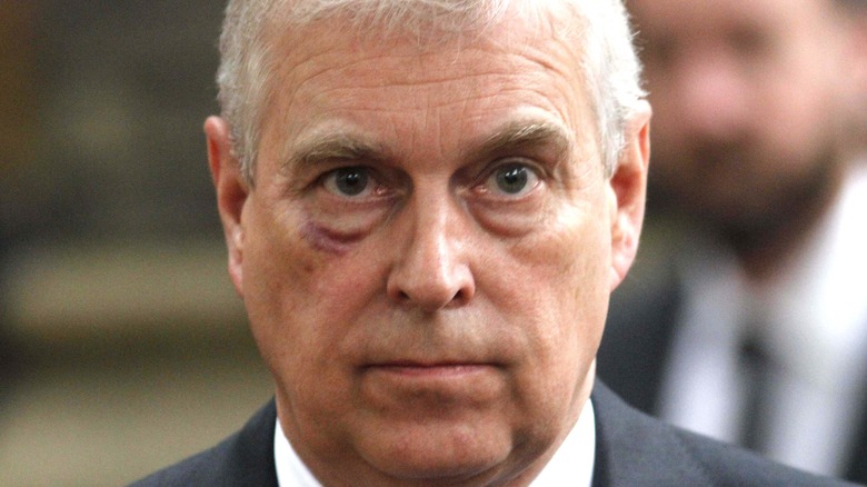 Prince Andrew looking grim