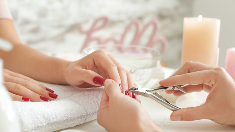 A woman getting a manicure