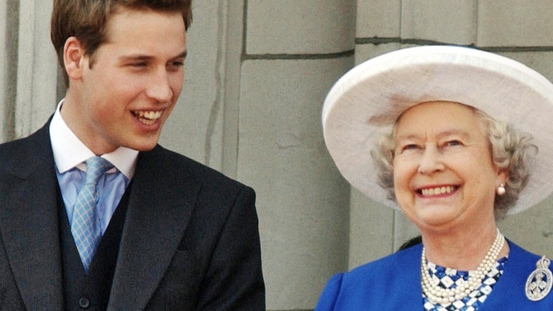 William, Prince of Wales and Queen Elizabeth II on the balcony