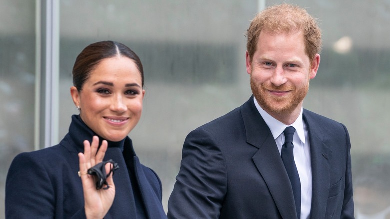 Harry and Meghan smiling