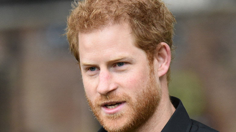 prince harry in a black t shirt