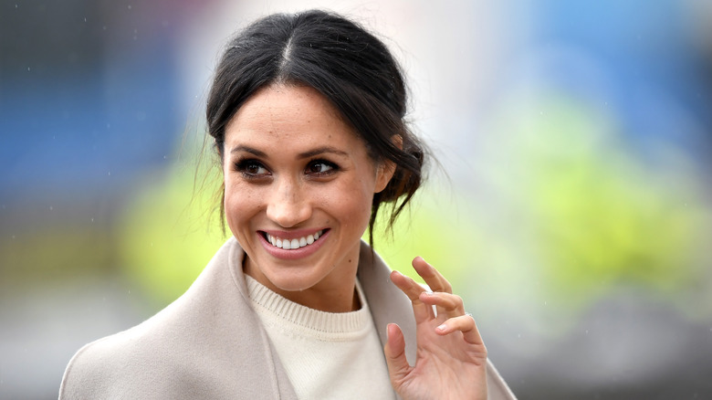 Meghan Markle smiles in public