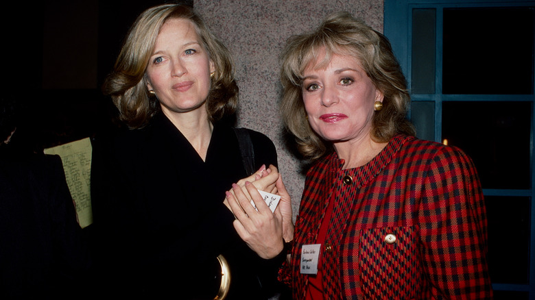 Diane Sawyer and Barbara Walters posing for photos