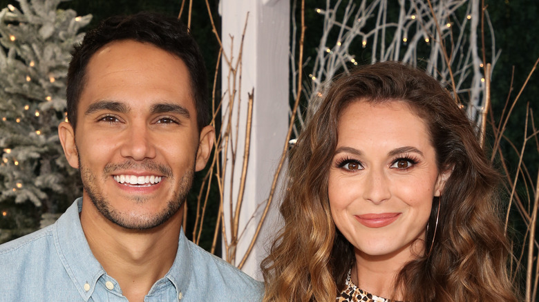 Alexa and Carlos PenaVega smiling together